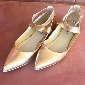 Rose gold ballet flats